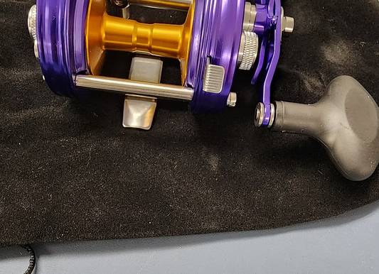 Hookers Terminal Tackle - 6500 / Right Hand / Purple Gold